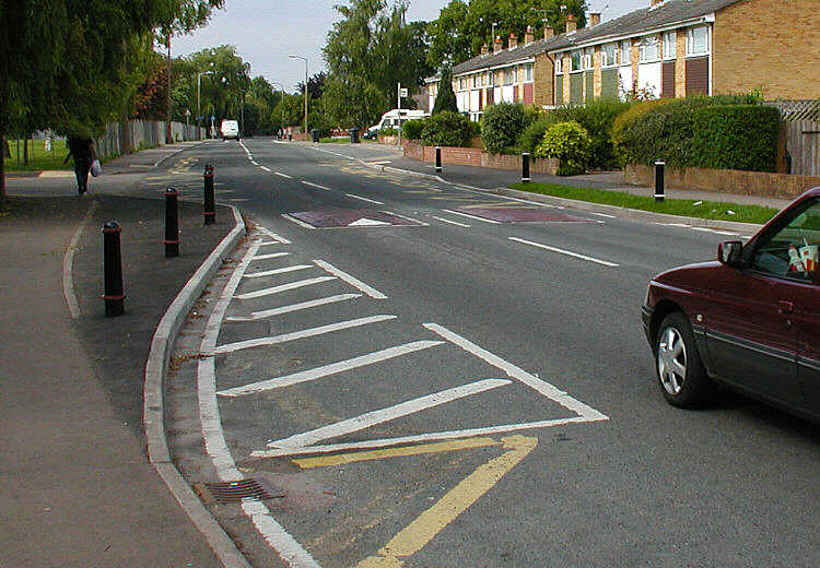 Speed cushions and curb extensions on a road in England